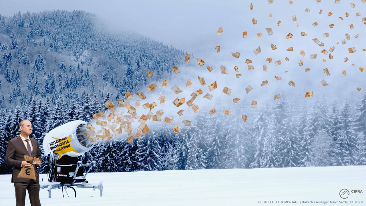 Fotomontage in der Hubert Aiwanger Euroscheine mit einer Schneekanone in der Winterlandschaft verschießt